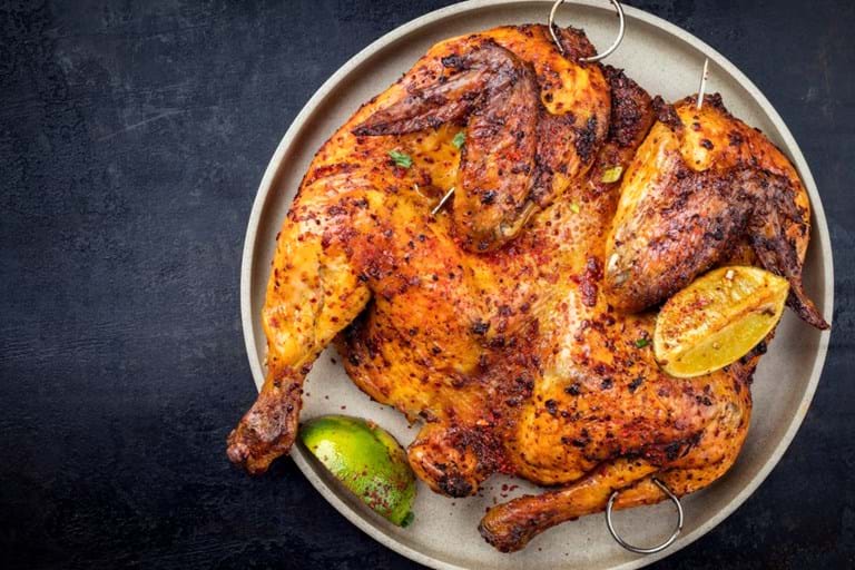cooking a butterflied chicken on a weber q